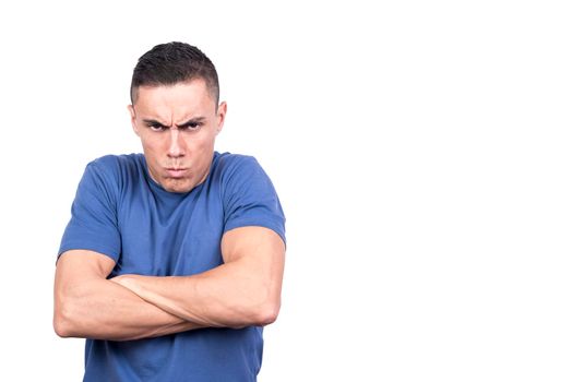 Studio photo with white background of a man gesturing that he is upset crossing his arms