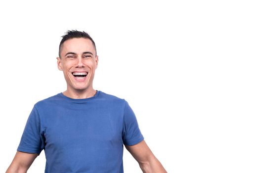 Studio portrait with white background and copy sapce of a caucasian man laughing