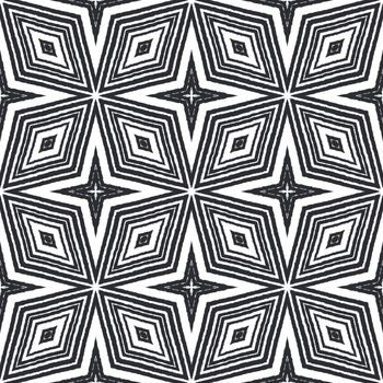 Chevron stripes design. Black symmetrical kaleidoscope background. Textile ready good-looking print, swimwear fabric, wallpaper, wrapping. Geometric chevron stripes pattern.