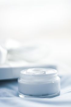 Beauty, cosmetics and skincare styled concept - Luxury face cream jar and white gift box