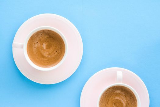 Breakfast, drinks and modern lifestyle concept - Hot aromatic coffee on blue background, flatlay