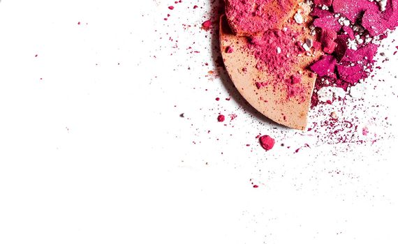 Beauty texture, cosmetic product and art of make-up concept - Crushed eyeshadow palette and powder close-up isolated on white background