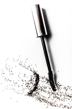 Beauty texture, cosmetic product and art of make-up concept - Black mascara brush stroke close-up isolated on white background