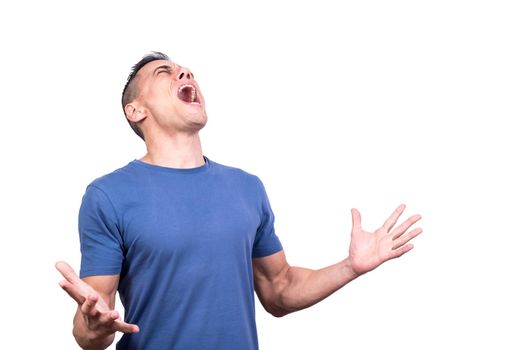 Studio portrait with white background of a caucasian man screaming in despair with his eyes closed