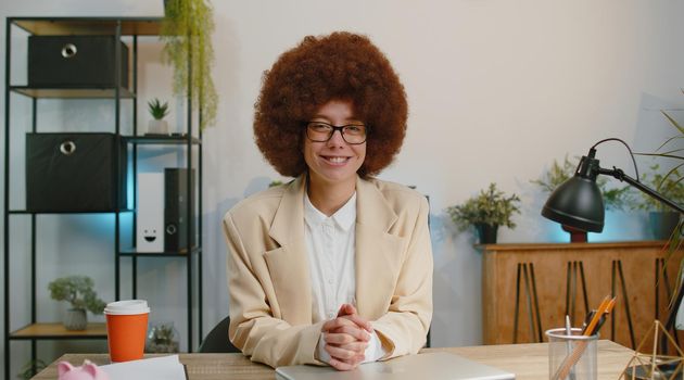 Businesswoman closing laptop pc computer after finishing work at home office desk. Smiling female manager freelancer woman busy working online, remote job. E-learning, browsing internet on notebook