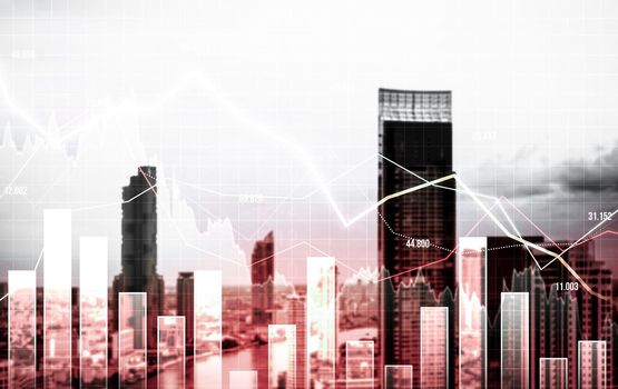 Economic crisis concept shown by digital indicators and graphs falling down with modernistic urban, city area. Double exposure. Stock market crash concept.