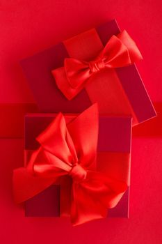 Romantic celebration, lifestyle and birthday present concept - Luxury holiday gifts on red