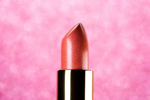 Lipstick on pink background. Showcase or advertisement for beauty brand, Concept of fashion, cosmetics. High quality