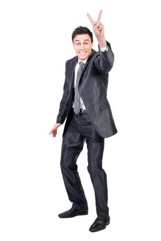 Full body of happy male in formal suit showing v sign and looking at camera with smile isolated on white background