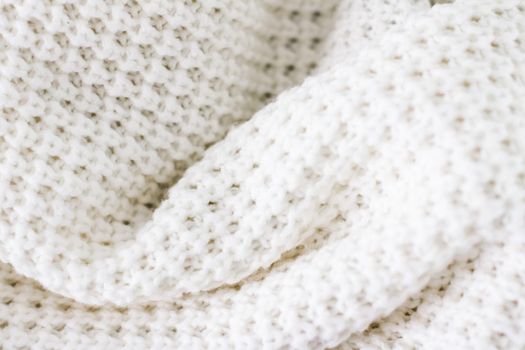 Knitwear, fabric textures and handmade items concept - Warm knitted clothes, soft and white
