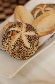 Gluten free pastry, eating out and healthy lifestyle concept - Fresh white bread in a restaurant