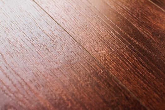 Flooring, new apartment and home renovation concept - Red wood texture, interior design