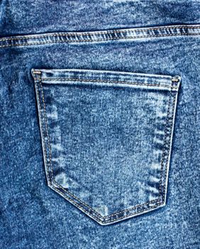 back pocket on jeans. Denim fabric texture. Sewn-in pocket, empty. High quality photo