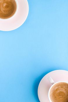 Breakfast, drinks and modern lifestyle concept - Hot aromatic coffee on blue background, flatlay