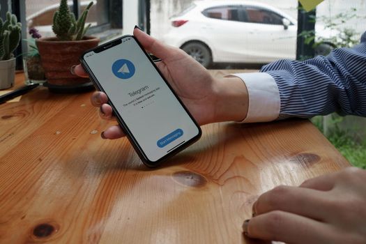 CHIANG MAI, THAILAND, AUG 26, 2022: Telegram application icon on iPhone. Telegram app icon. Telegram is an online social media.