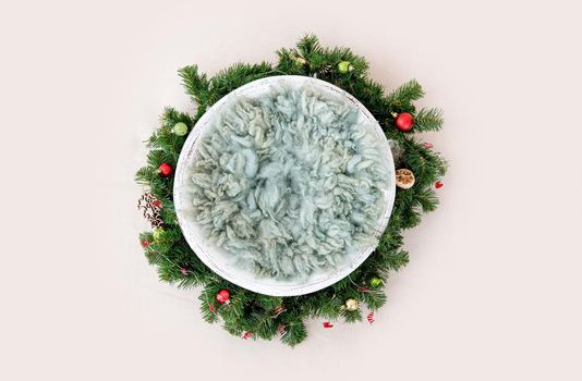 Festive Christmas furniture decoration for newborn baby photoshoot. Beautiful New Year spot for infant child photo