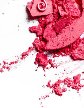 Beauty texture, cosmetic product and art of make-up concept - Crushed eyeshadows, lipstick and powder isolated on white background