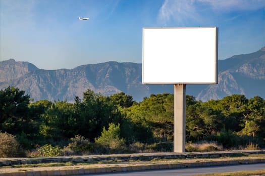 blank open air billboard megaboard mock up in the city on sunny day