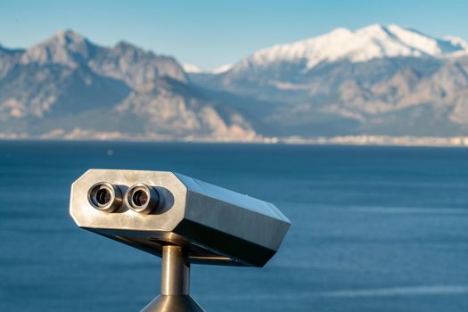 stationary observation binoculars at sunrise on a sunny winter day in Antalya Turkey