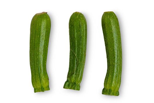 Green baby zucchini isolated on white studio background