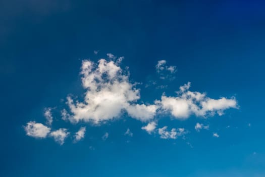 White cloud in the middle of blue sky.