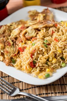 Regional African Food on white plate on wooden background