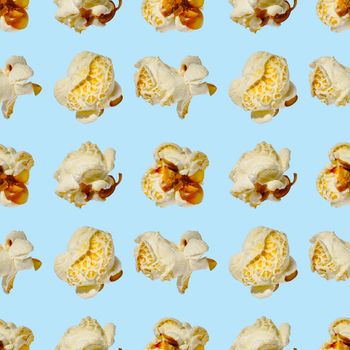 seamless pattern - popcorn. popcorn on a blue background, pattern for designer. packing design background