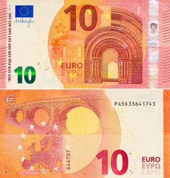 One ten Euro bill. 10 euro banknote close-up. The euro is the official currency of 19 out of the 27 member states of the European Union