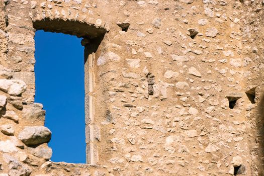 Stone window and brickwork of Chateau de Miglos, or d'Arquizat, a ruined castle in Miglos, Ariege, Occitanie, France. It is a listed national historic monument of France.
