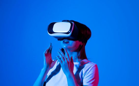 Close up of woman engineer, architector in vr headset working with engineering project in studio