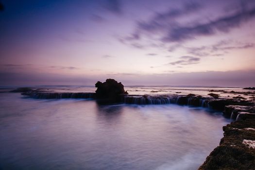 The iconic Dragon Head Rock at sunset on the Number Sixteen Beach in Rye, Victoria, Australia