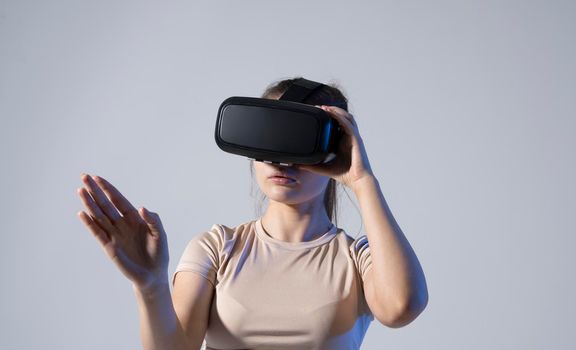 Interior Designer woman Using a VR Software and VR headset to Design a project of new home