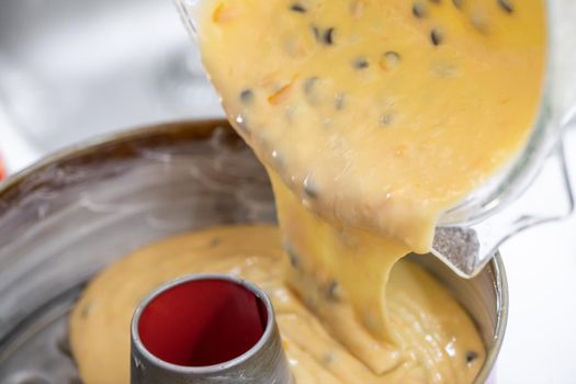 Motion blur photo of pouring homemade delicious cake