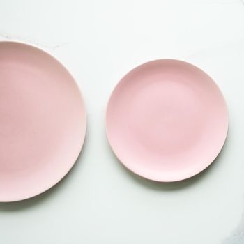 Pink empty plate on marble, flatlay - stylish tableware, table decor and food menu concept. Serve the perfect dish
