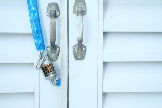 date door was locked with padlocks and chains.
