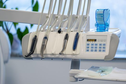 Modern dental practice. Dental chair and other accessories used by dentists