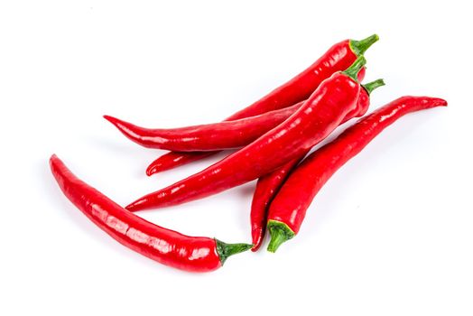 Hot red chili pepper on white background