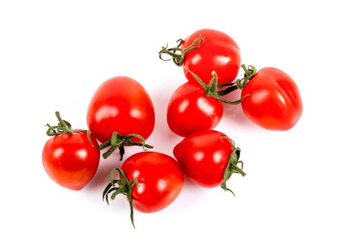 Fresh cherry tomatoes on a white background