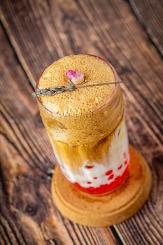 Fruity Bubble Tea in glass cup on wooden background