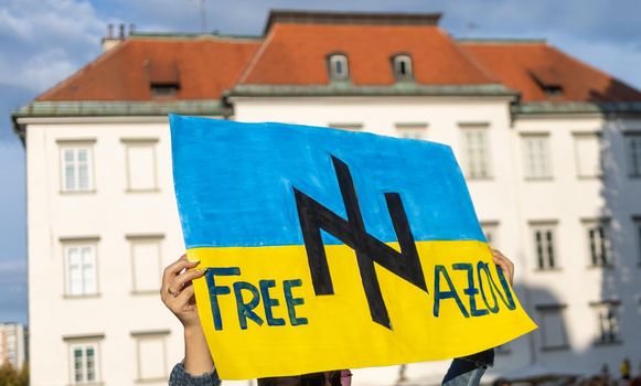 LJUBLJANA, SLOVENIA - August 24, 2022: Ukraine independence day meeting. People with flags and national symbols. High quality photo