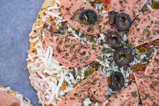 Frozen Italian pizza ready to be baked