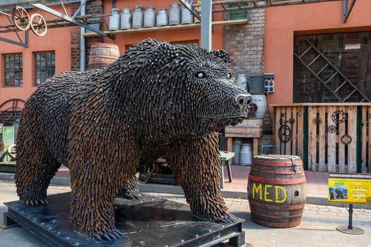 Stare Mesto, Czech Republic 29 April 2022. KOVOZOO original exhibition with animals and technology from recycled old scrap Modern art plus exhibition of historical technology Bear