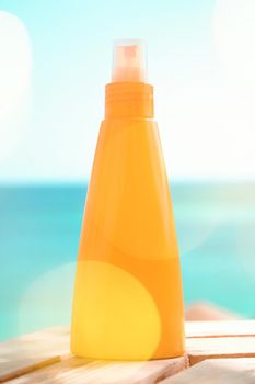 Suntan lotion outdoors - summer vacation, travel and body care concept. Protect your skin on the beach