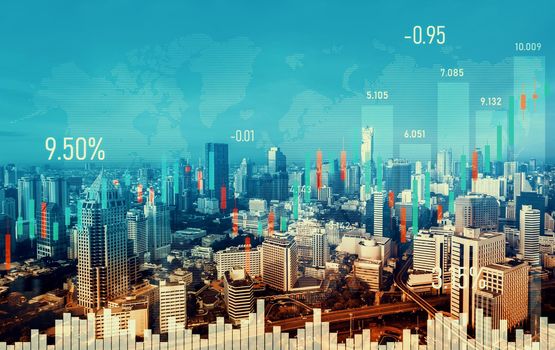 Financial graphs and digital indicators overlap with modernistic urban area, skyscrabber for stock market business concept. Double exposure.