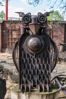 Stare Mesto, Czech Republic 29 April 2022.KOVOZOO original exhibition with animals and technology from recycled old scrap Modern art plus exhibition of historical technology, iron owl
