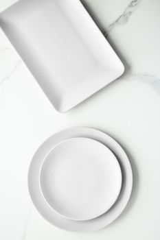 White empty plate on marble, flatlay - stylish tableware, romantic table decor and food menu concept. Serve the perfect dish