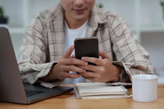 Man Completes KYC using an online banking app in order to open a digital savings account. The definition of cyber security