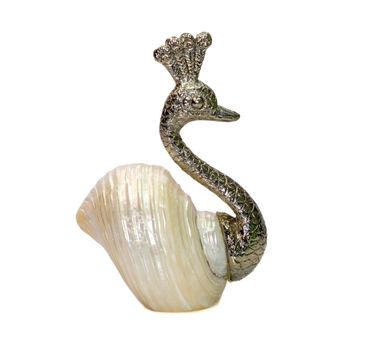 Image of peacock sculpture with shells as part of its body. isolated on white background. Home decoration
