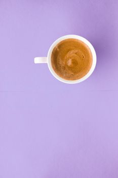 Breakfast, drinks and cafe menu concept - Coffee cup on purple background, top view flatlay