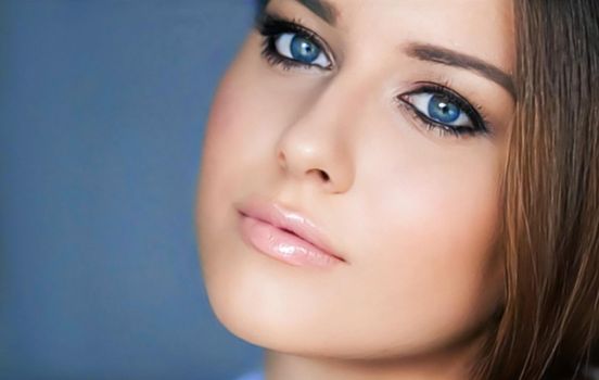 Beauty and make-up, beautiful woman with smokey eyes makeup, face portrait close-up